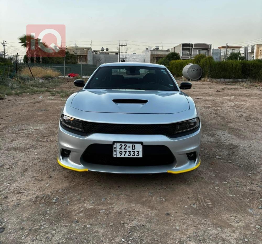 دۆج چارجەر